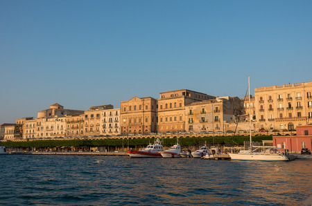 Syracuse, Italy - August 31, 2017:  Sunset in Embankment of Ortygia island, Syracuse city, in Sicily.のeditorial素材