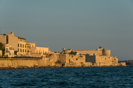 Sunset in Embankment of Ortygia island and Castello Maniace , Syracuse city, in Sicily.の写真素材
