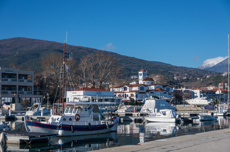 Platamonas, Greece - January 2, 2018: Harbor with boats and fishing schooners. Platamonas (Greek) is a sea-side resort and fishermans village in south Pireia, Central Macedonia.のeditorial素材
