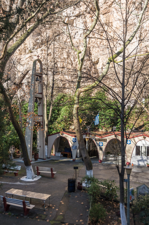 The Orthodox church of Agia Paraskevi with the bell tower between trees in the beautiful valley of Tempi in Thessaly, Greece, Europe.のeditorial素材
