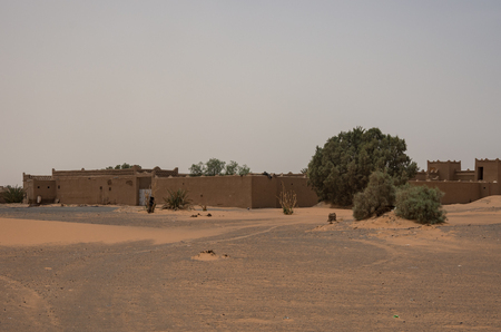 Merzouga village near sahara Erg Chebbi  dune in sand storm. Moroccoの写真素材