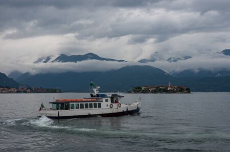 Lake Maggiore,Italy-August 31,2018:   Ferry boat at lake Maggiore in Piedmont, Italyのeditorial素材