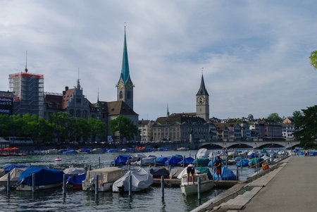 Zurich, Switzerland- August 22, 2010: Panoramic view of historic Zurich city center with famous Fraumunster church and river Limmat at Lake Zurich, Canton of Zurich, Switzerlandのeditorial素材