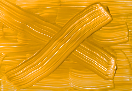 Yellow brown background texture made with acrylic paintの写真素材