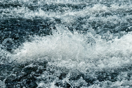 Water on a threshold of the river is rolled and rages