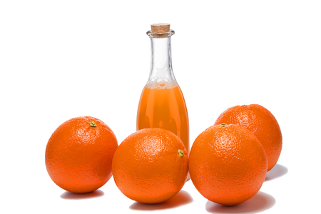 Beautiful fresh oranges and utensils, isolated on white backgroundの写真素材