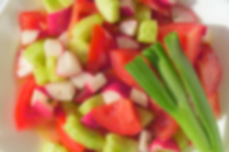 Blurred background texture, vegetable salad in defocusの写真素材