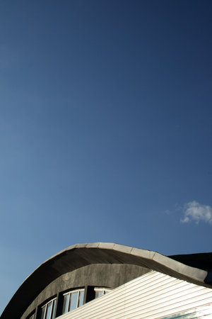 roof of modern building on sky