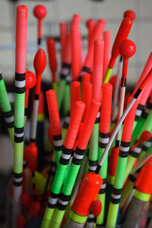 Many fishing floats on a counter of shop