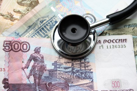 illness of russian economic, stetoscope on rouble backgroundの写真素材
