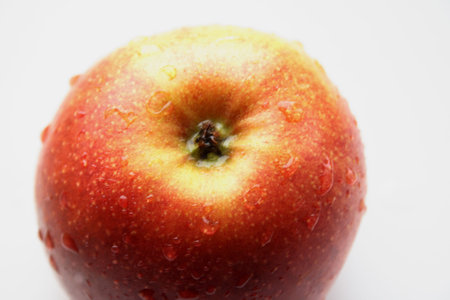 red apple with drops