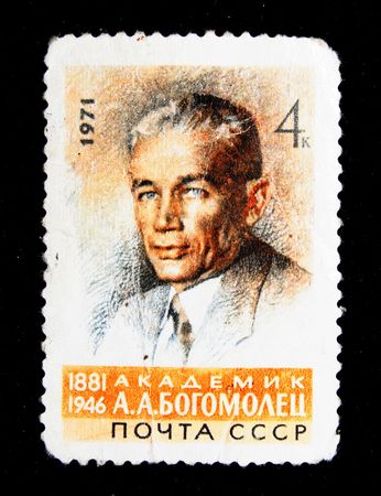 A stamp printed in the USSR show academist Alexander Bogomolets The physiologist, the president of the Academy of sciences of Ukraine, vice-president of the Academy of sciences of the USSR and Academy of Medical Sciences of the USSR circa 1971のeditorial素材
