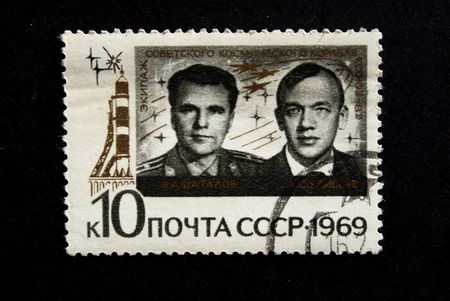 A stamp printed in the USSR show cosmonauts Shatalov and Eliseev, one stamp from series, circa 1969の写真素材