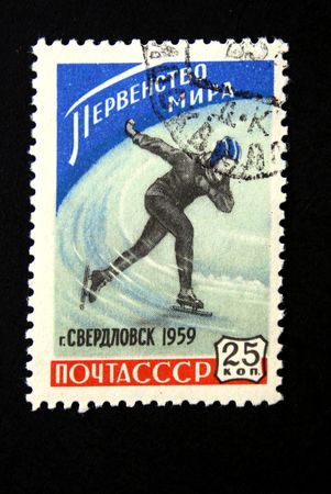 A stamp printed in the USSR shows skater, devoted Superiority of the world on skates in Sverdlovsk, Russia, circa 1959の写真素材