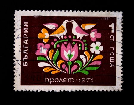 A stamp printed in Bulgaria shows abstract pattern with two birds, circa 1971の写真素材
