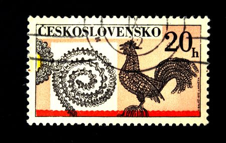 A stamp printed in Czechoslovakia shows cock weaved from wickers, circa 1970sの写真素材