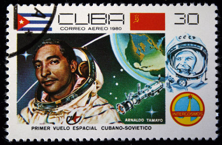 A stamp printed in Cuba shows cosmonaut Armaldo Tamayo, stamp from series honoring Intercosmos...