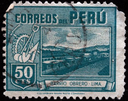  PERU - CIRCA 1940s: A stamp printed in Peru shows Bario Obrero - Lima, circa 1940s の写真素材