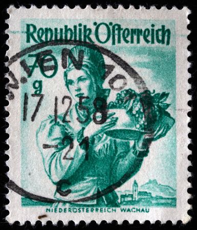  AUSTRIA - CIRCA 1958: A stamp printed in Austria shows woman with fruts, circa 1958 の写真素材