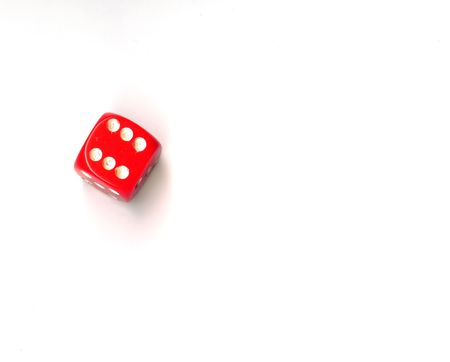 red dice with the number six isolated on whiteの写真素材