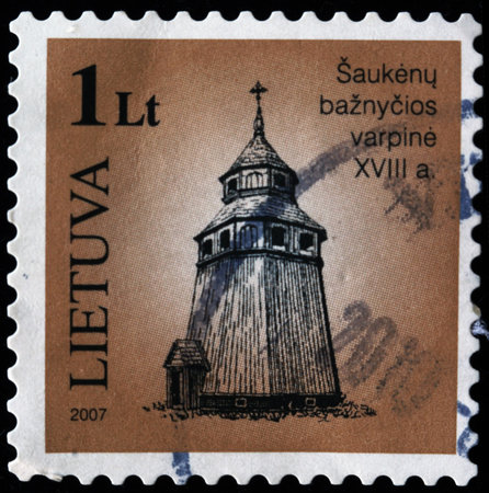 Lithuania - CIRCA 2007: A stamp printed in Lithuania shows Saukeniu baznycios varpine XVIII cenchury, circa 2007 の写真素材