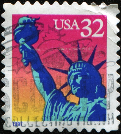 USA - CIRCA 1997: A stamp printed in US shows image of Statue of Liberty,series, circa 1997の写真素材