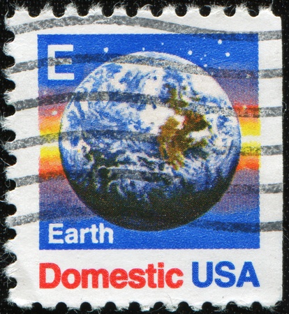 USA - CIRCA 1988: A stamp printed in USA shows earth, circa 1988の写真素材