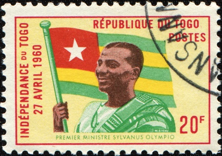 TOGO - CIRCA 1960: A stamp printed in Togo shows Prime Minister Sylvanus Olympio, circa 1960の写真素材