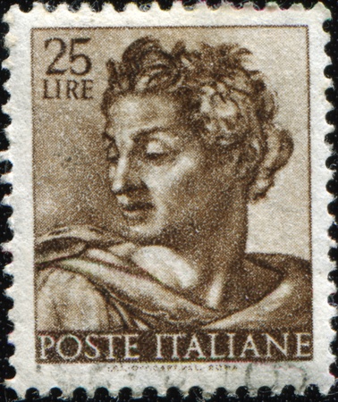 ITALY - CIRCA 1961: A stamp printed in Italy shows Isaiah, fragment of painted ceiling of the Sistine Chapel, Vatican, fresco by Michelangelo, circa 1961のeditorial素材