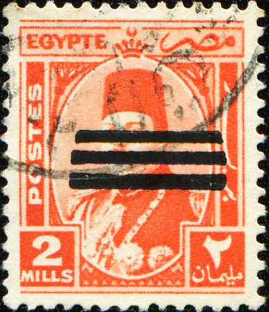 EGYPT-CIRCA 1944-1950: A stamp dedicated to the Farouk I of Egypt (11 February 1920 - 18 March 1965), was the tenth ruler from the Muhammad Ali Dynasty, circa 1944-1950の写真素材