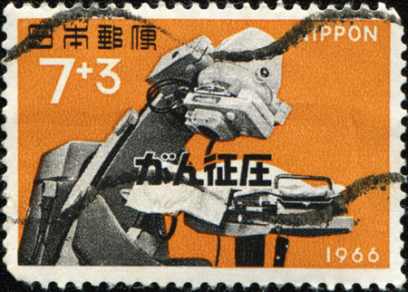 JAPAN - CIRCA 1966: A stamp printed in Japan shows Equipment for radioactive therapy for cancer, circa 1966の写真素材