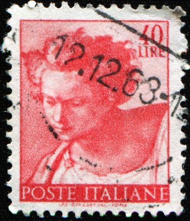 ITALY - CIRCA 1961: A stamp printed in Italy shows Daniel, fragment of painted ceiling of the Sistine Chapel, Vatican, fresco by Michelangelo, circa 1961 の写真素材