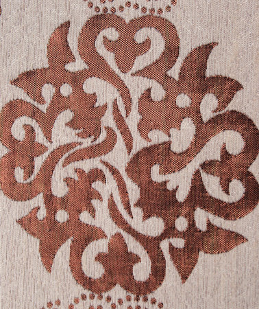 fragment of antique textile with oriental symmetry pattern