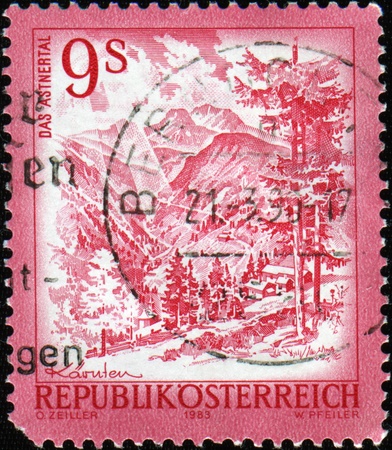 AUSTRIA - CIRCA 1983: A stamp printed in Austria shows wiev of Carinthia is the southernmost Austrian state or Landの写真素材