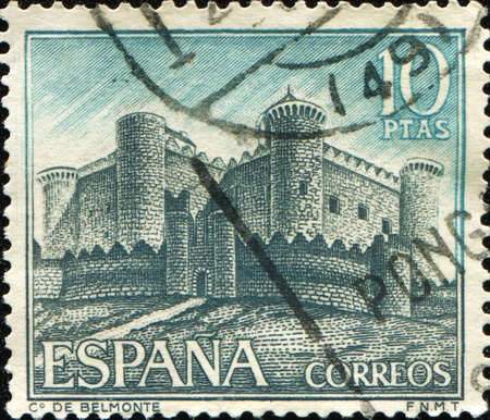 SPAIN - CIRCA 1967: A stamp printed in Spain shows elmonte Castle (Castillo de Belmonte) in Belmonte, Cuenca province, series, circa 1967の写真素材