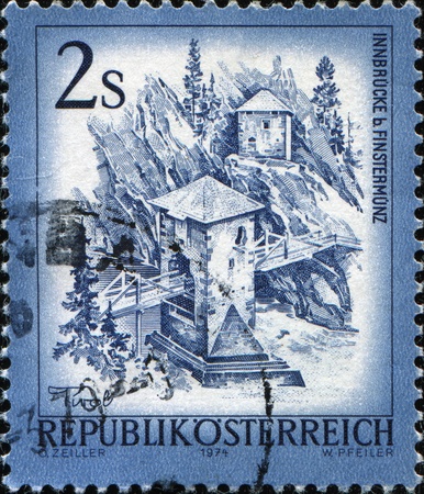 AUSTRIA - CIRCA 1974: A stamp printed in Austria, is shown Inn Bridge, Finstermuenz, circa 1974 の写真素材