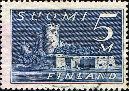 FINLAND - CIRCA 1930: A stamp printed in Finland shows  Olavinlinna 15th century three-tower castle located in Savonlinna, circa 1930の写真素材