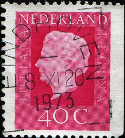 NETHERLANDS - CIRCA 1973: A stamp printed in the Netherlands shows image of Queen Juliana, series, circa 1973のeditorial素材