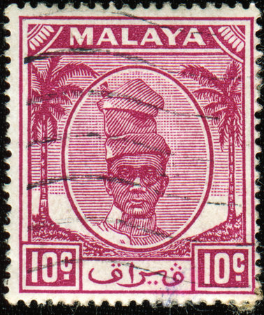 PERAK - CIRCA 1950: A stamp printed in Perak (a state in the current Federation of Malaysia) shows 	Sultan Yussuf Izzuddin Shah of Perak, circa 1950の写真素材
