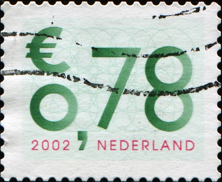 NETHERLANDS - CIRCA 2002: 78 cent Netherlands post stamp shows numeros, series, circa 2002の写真素材
