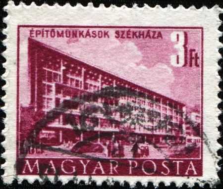 HUNGARY - CIRCA 1951: A stamp printed in Hungary shows Building Workers' Union Headquarters, circa 1951の写真素材