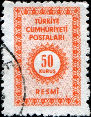 TURKIE - CIRCA 1965: An Official Stamp printed in Turkey shows 50 kurus in the center, circa 1965の写真素材