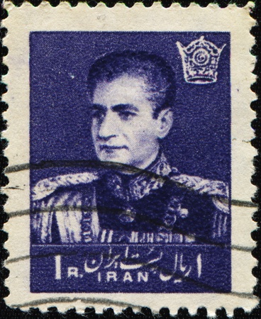 IRAN - CIRCA 1958: A stamp printed in the Iran shows Mohammad Reza Pahlavi of Iran, circa 1958 の写真素材