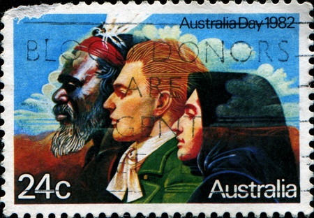 AUSTRALIA - CIRCA 1982  A stamp shows image of a Australian Aborigines and English messioner, circa 1982 の写真素材