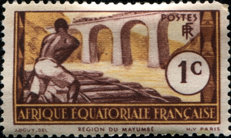 FRENCH EQUATERIAL AFRICA - CIRCA 1938  A stamp printed in French Equatorial Africa  now Gabon  shows Logging near Mayumba, circa 1938のeditorial素材