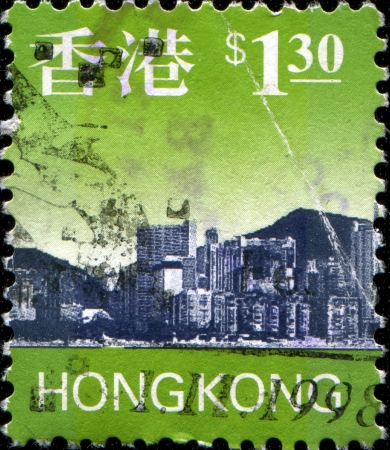 Hong Kong - CIRCA 1998  A stamp printed in Hong Kong shows skyline Victoria Harbour, circa 1998 のeditorial素材