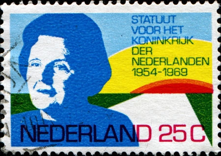 NETHERLANDS - CIRCA 1969  A stamp printed in the Netherlands shows Queen Juliana and Sunlit Road, circa 1969のeditorial素材