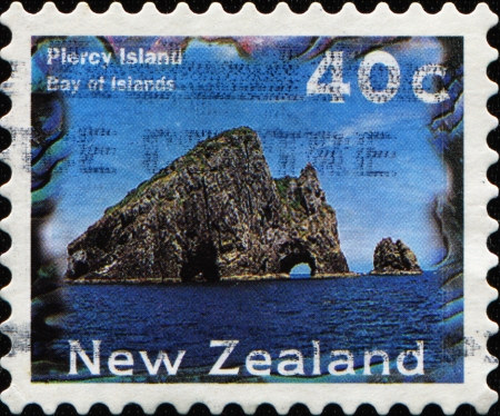 NEW ZEALAND - CIRCA 1996  A stamp printed in New Zealand shows Plercy Island, Bay in Islands, series, circa 1996の写真素材