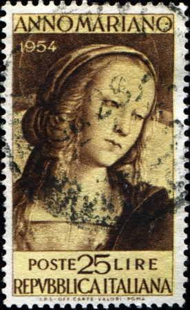 iTALY - CIRCA 1954  A stamp printed in Italy shows draw Madonna by Perugino, circa 1954のeditorial素材