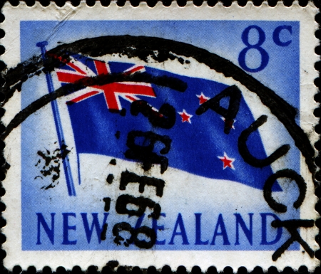 NEW ZEALAND - CIRCA 1967  A stamp printed in New Zealand shows New Zealand flag, circa 1967の写真素材